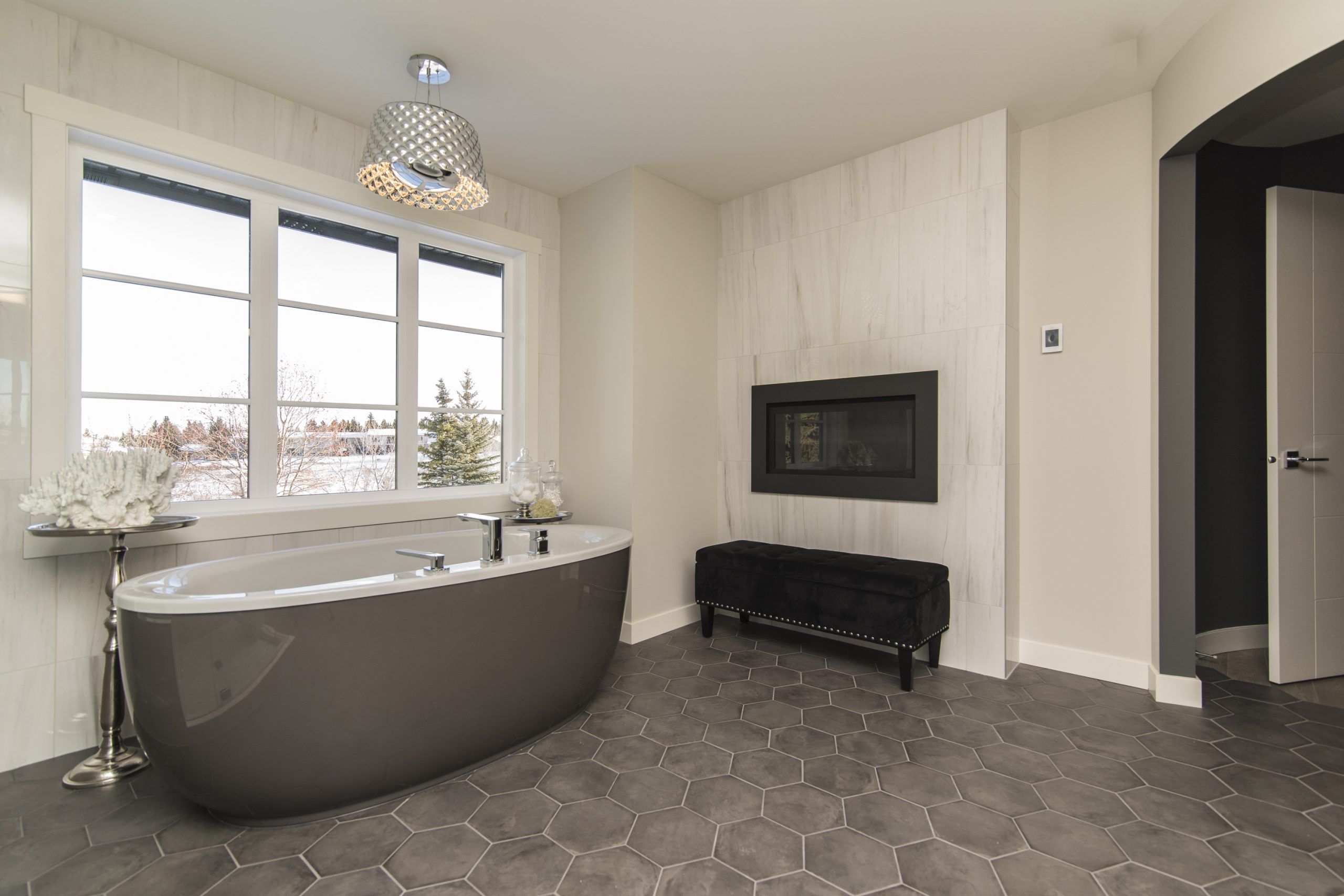 A beautiful shot of a modern house bathroom with technology and art