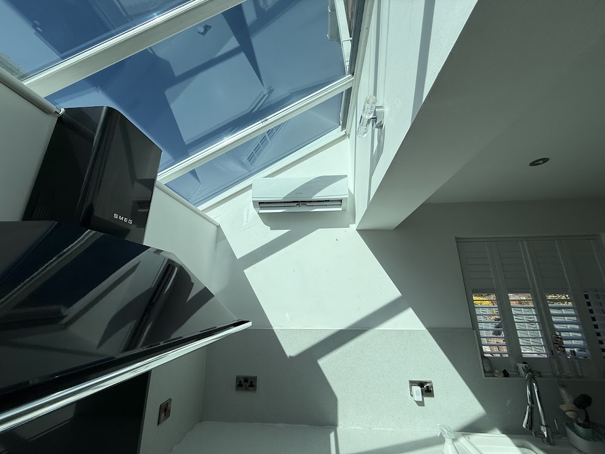 Professional air conditioning installation in a contemporary UK home interior
