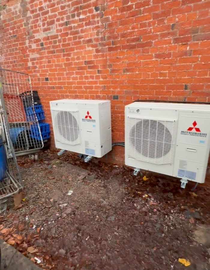 Mitsubishi outdoor condenser units installed for a commercial air conditioning system in the Wales.